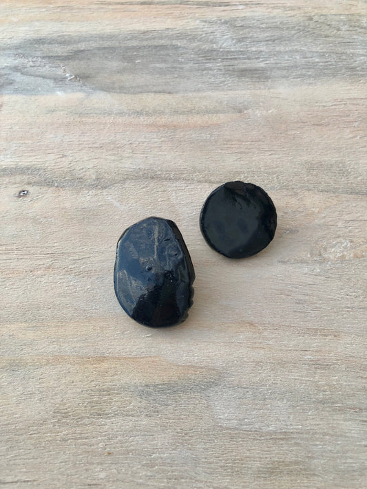 Aretes Roto Negro