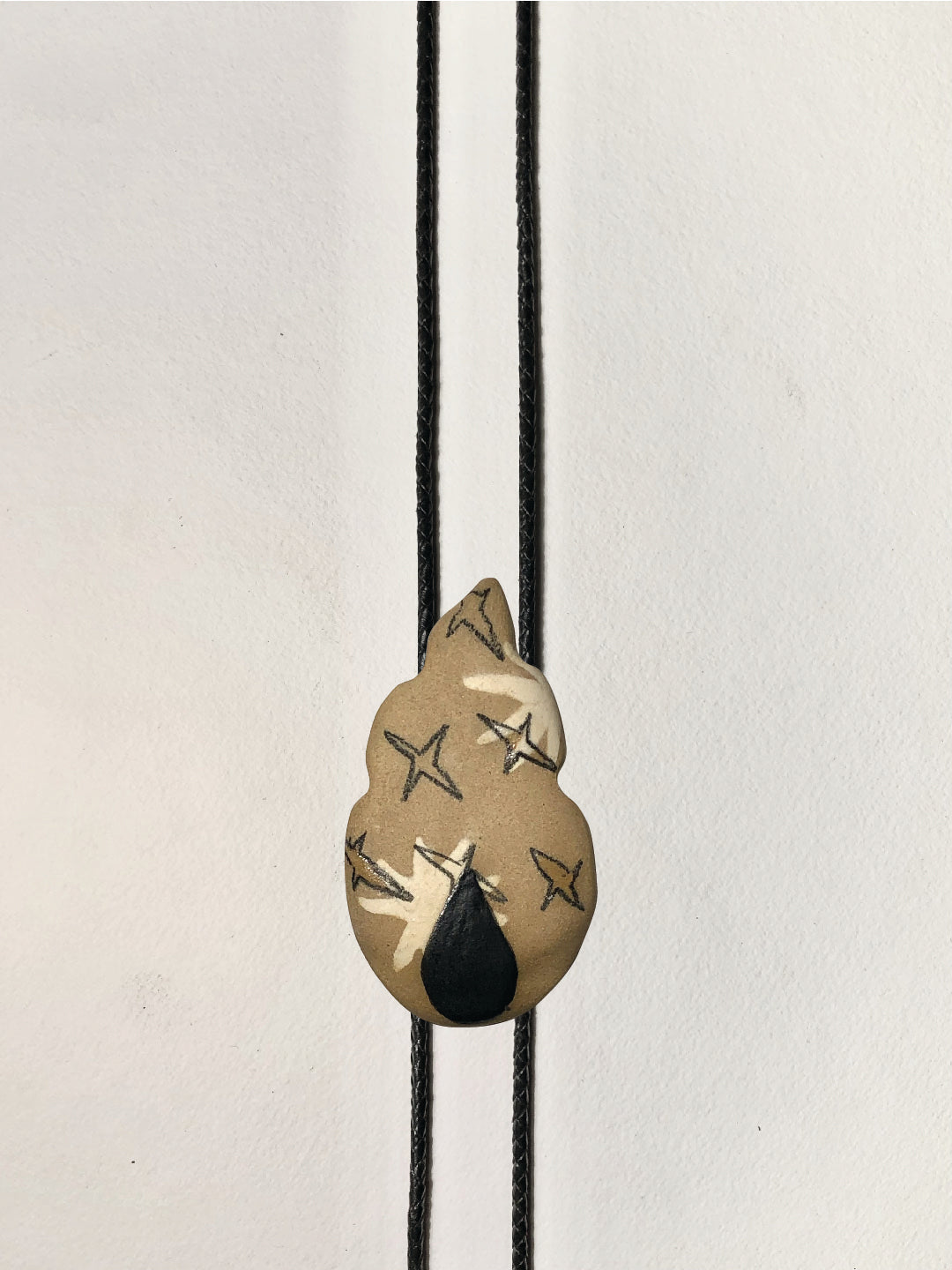 Flama bolo tie